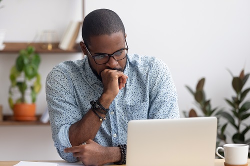 Man-working-at-computer-500